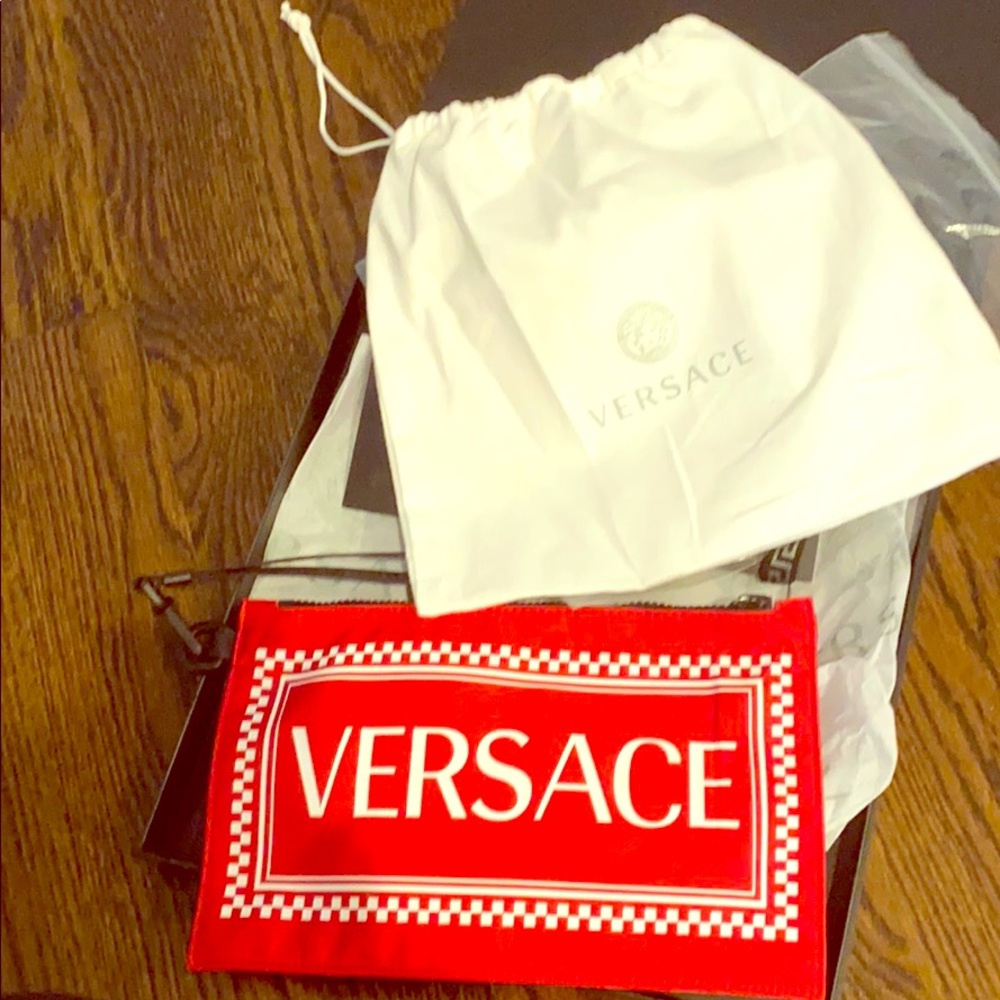 Brand new Authentic Vercase wrislet/ pouch